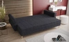 Sofa z funkcją spania Wilkins musztardowa elegancka sofa do salonu w stylu skandynawskim zaoblone boczki nadają charakteru