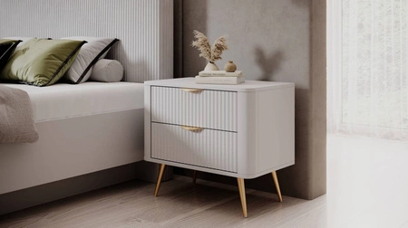 Szafka nocna Lante biała stylowa szafka z szufladami idealna do sypialni w stylu glamour i skandynawskim oryginalny kształt bryły