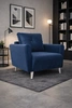 Fotel Felicie granatowy elegancki fotel do salonu z obszernym i miękkim siedziskiem drewniane nóżki nadają wizualnej lekkości