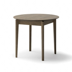 Stół okrągły rozkładany Plot 90 cm dąb ciemny funkcjonalny stół o niewielkich rozmiarach idealnie dopasuje się do mniejszych wnętrz