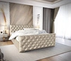 Łóżko tapicerowane Uberaba 140x200 beżowe z pojemnikiem w nowoczesnym skandynawskim stylu z pikowanym wezgłowiem i zanóżkiem z kryształkami