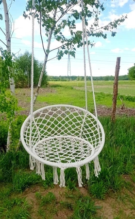 Fotel wiszący Nido ecru wykonany z plecionej liny fotel wiszący bocianie gniazdo idealnie dopasuje się do aranżacji w stylu boho