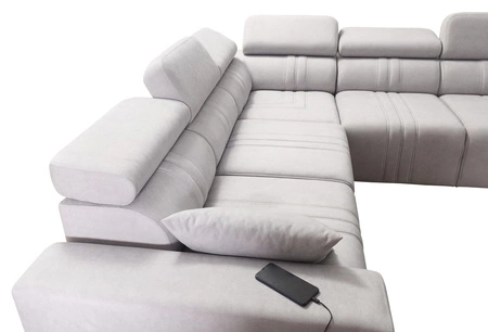 Narożnik z funkcją spania Castel III Lux beżowy lewostronny niezwykle komfortowy narożnik do salonu z wysuwanym podnóżkiem